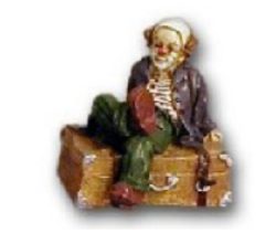 Clown sitting on a treasure chest K416