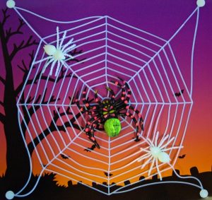 Spinnennetz mit Spinnen + Saugnpfen